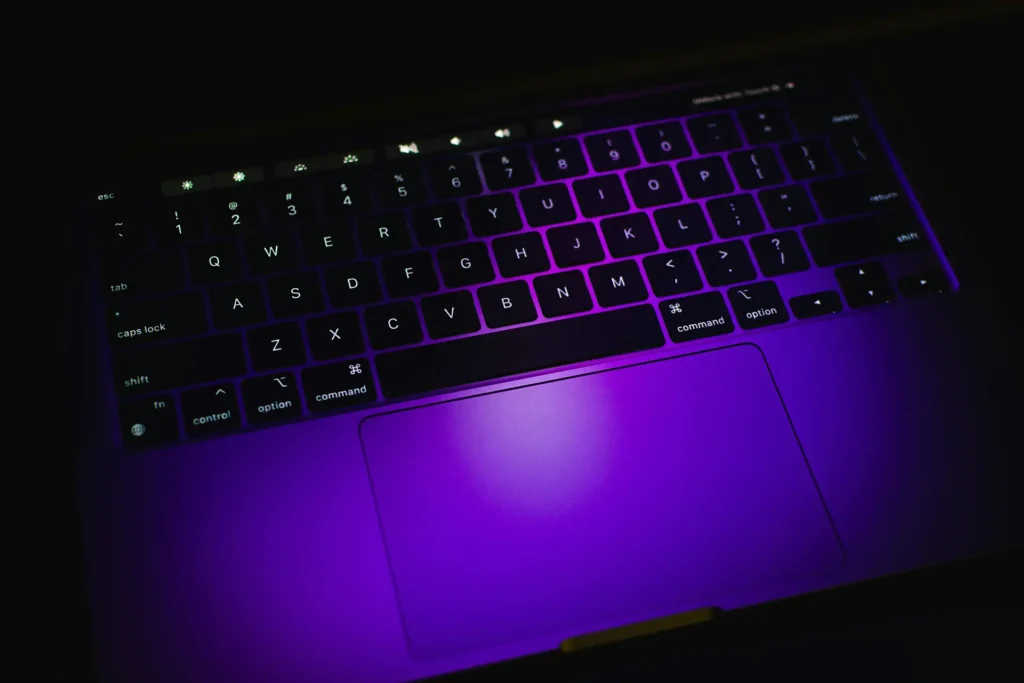 Node Verge Cyber Security laptop in purple lighting